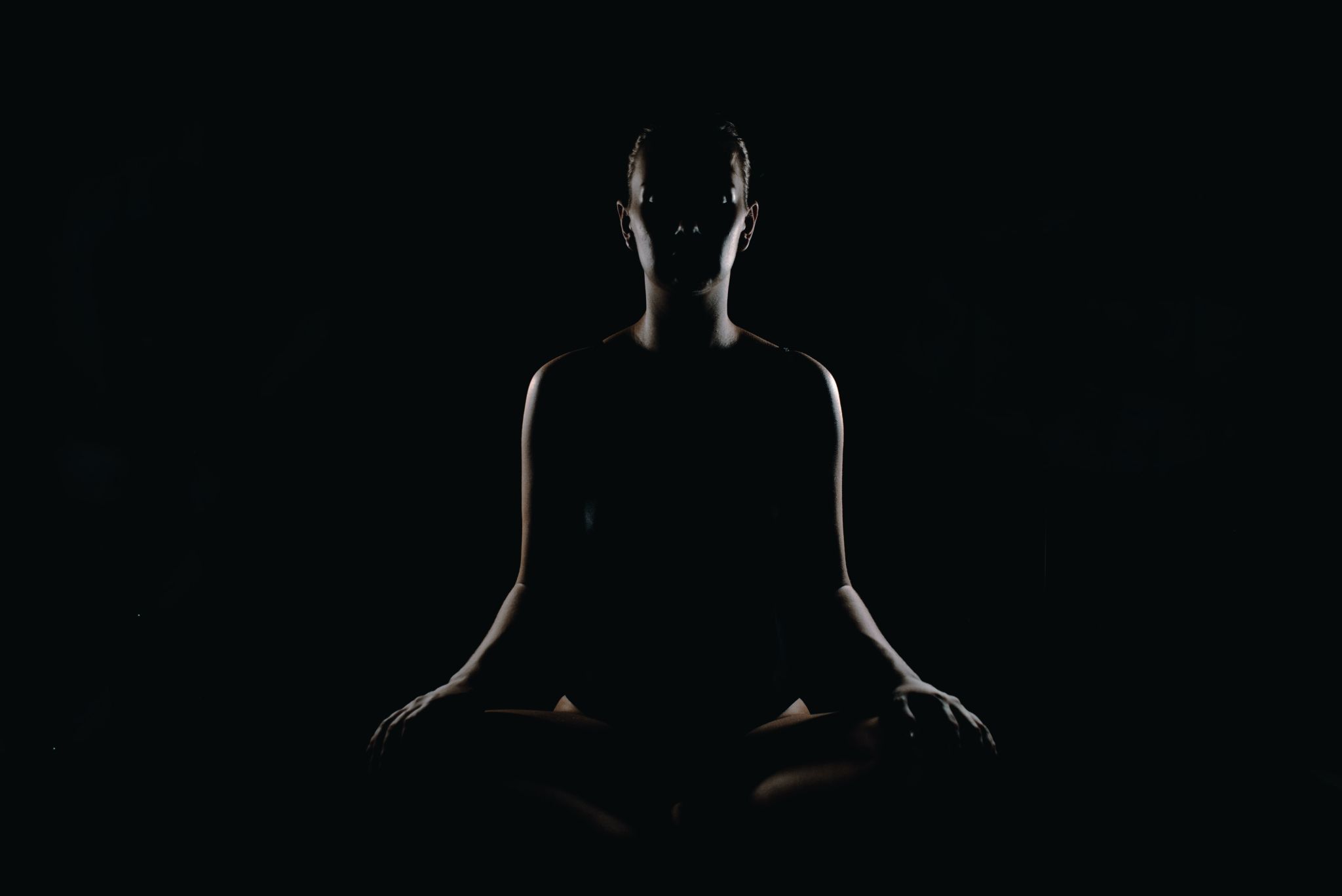meditator in shadow
